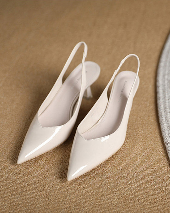 Hoge hakken met puntige neus in effen kleur