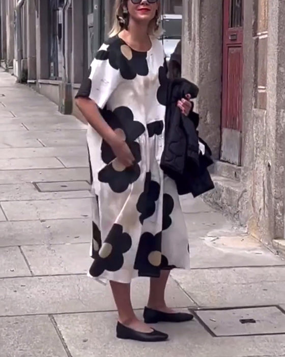 Losse jurk met bloemenprint, ronde hals en zak