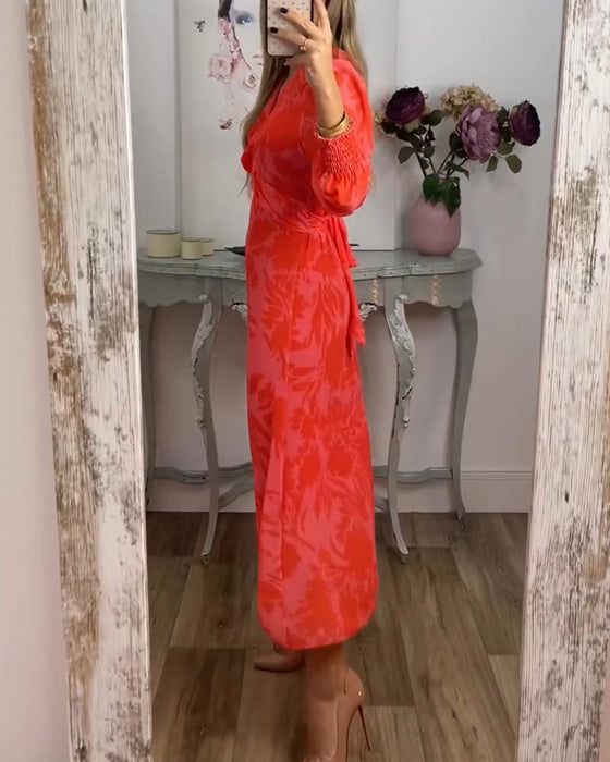 Jurk met V-hals en geknipte taille