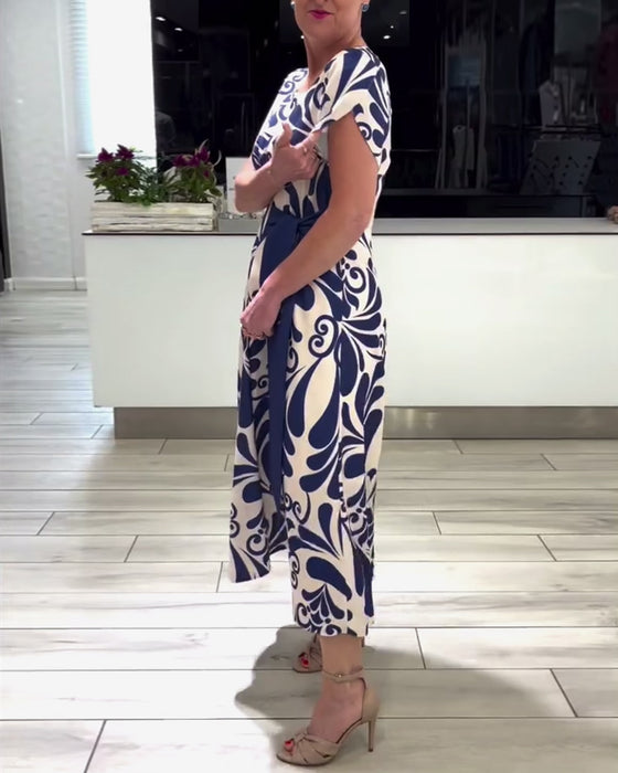 Elegante jurk met korte mouwen en contrastprint