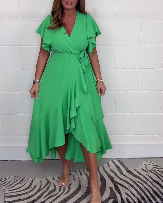 Elegante jurk met ruches, effen kleur en split