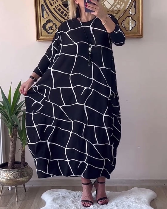 Jurk ronde hals lange mouw zak los