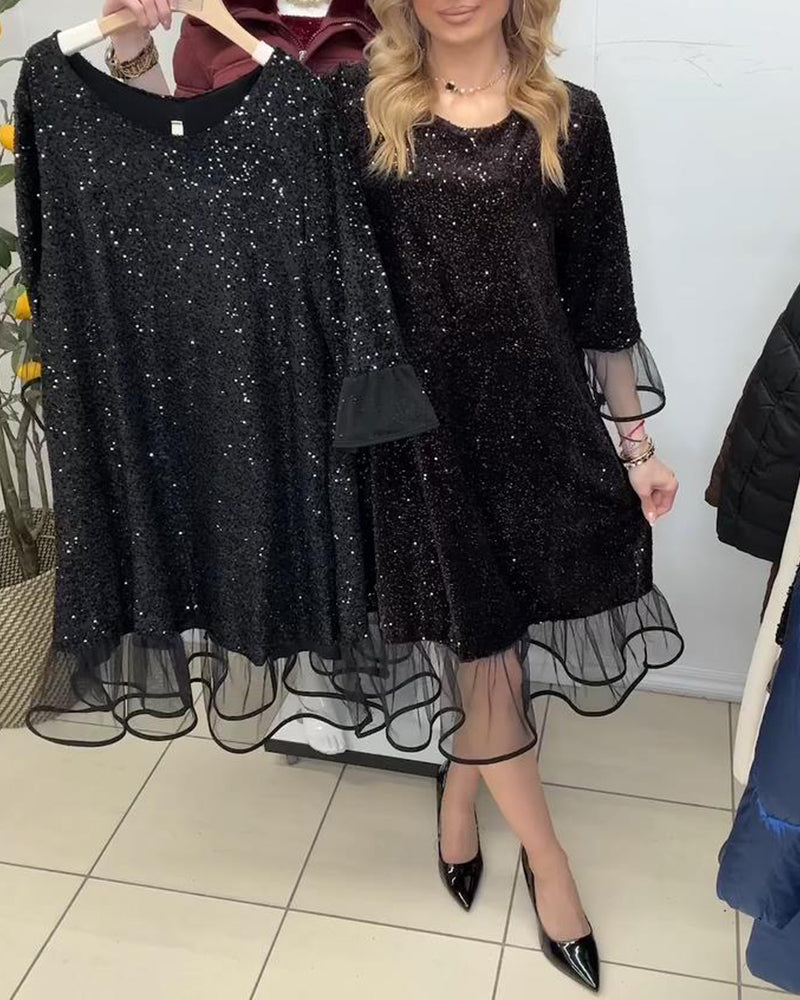 Modieuze Jurk Met Wijd Uitlopende Mouwen En Pailletten