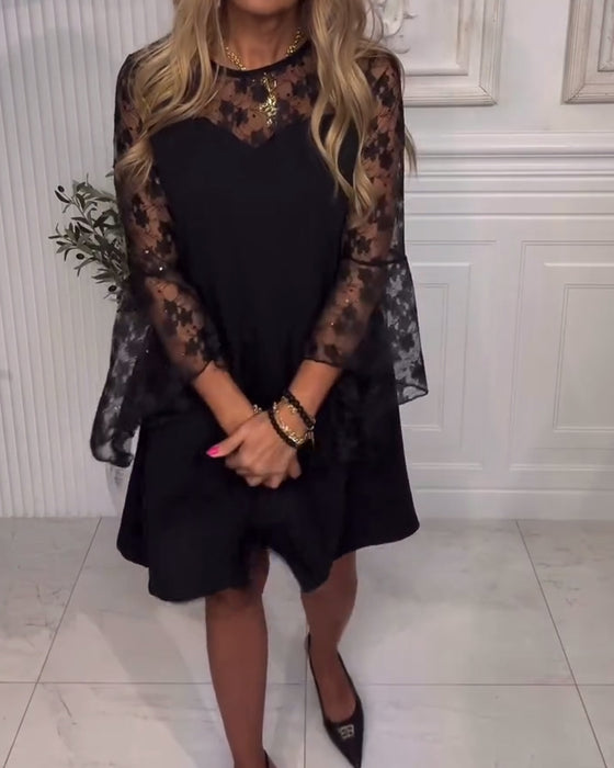 Effen Jurk Met Klokmouwen En Patchworkdetails