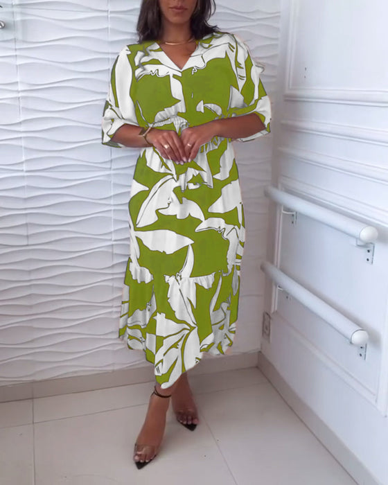 Elegante jurk met V-hals, driekwart mouw en trekkoord