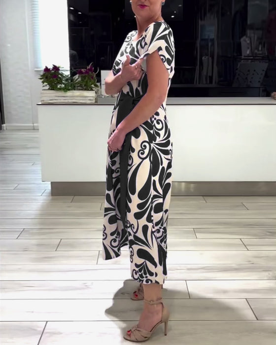 Elegante jurk met korte mouwen en contrastprint