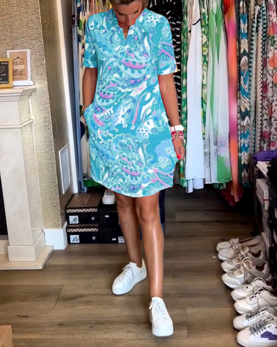 Jurk met zakken en prints en korte mouwen