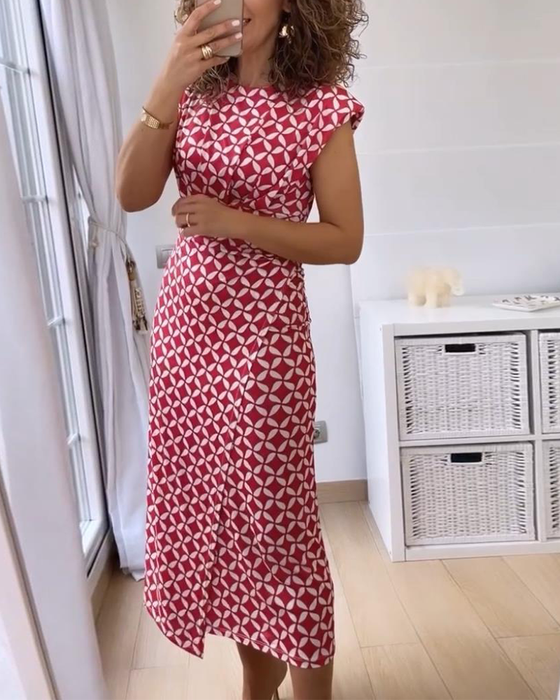 Mouwloze, elegante jurk met geometrische print en ronde hals