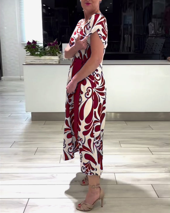 Elegante jurk met korte mouwen en contrastprint