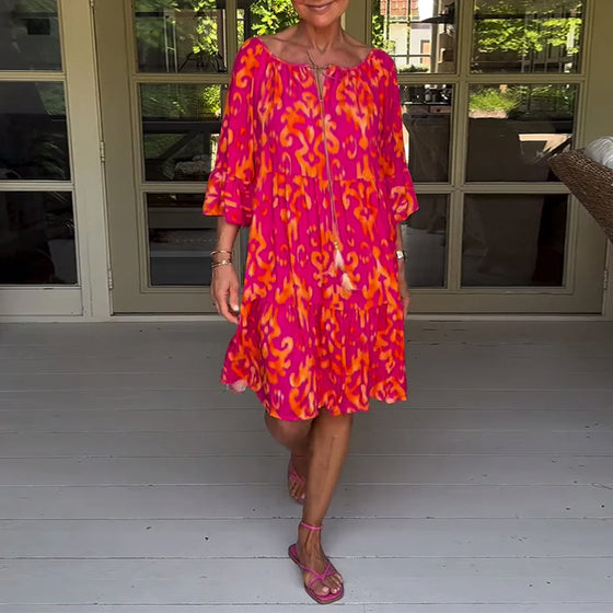 Jurk met losse print en klokmouwen