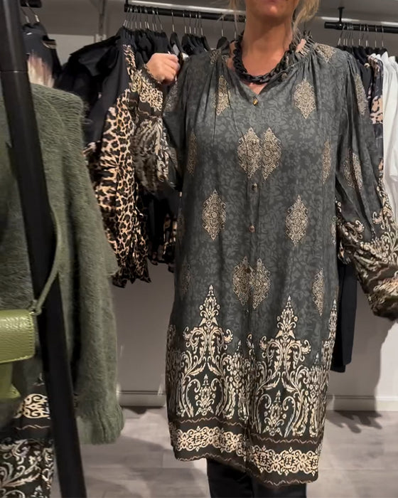 Vintage printjurk met revers en knoopjes