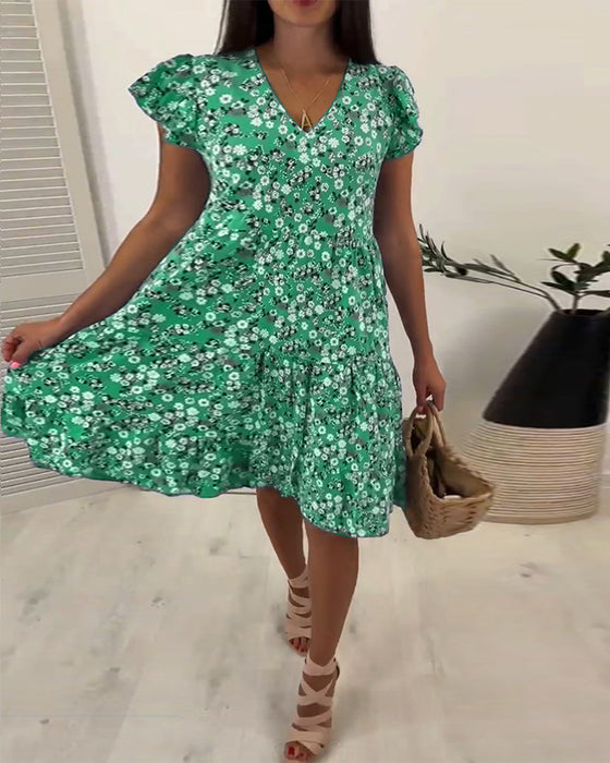 Mouwloze midi-jurk met V-hals en bloemenprint