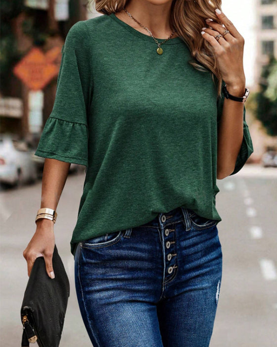 Elegante jurk met ronde hals, pofmouwen en print