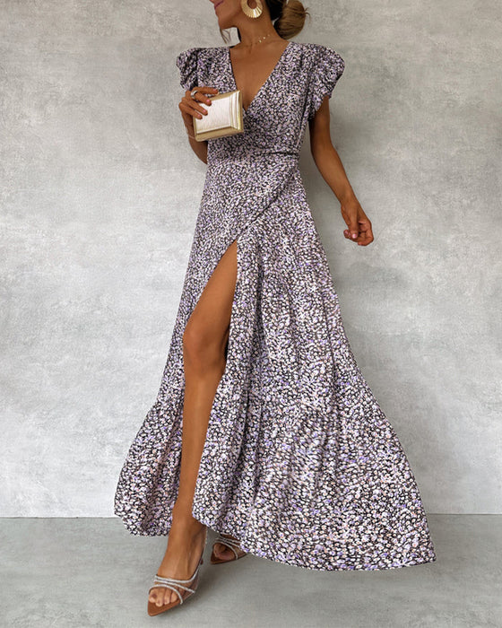 Elegante jurk met ruches aan de mouwen en split