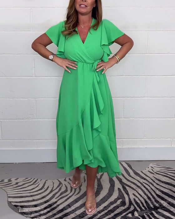 Elegante jurk met ruches, effen kleur en split