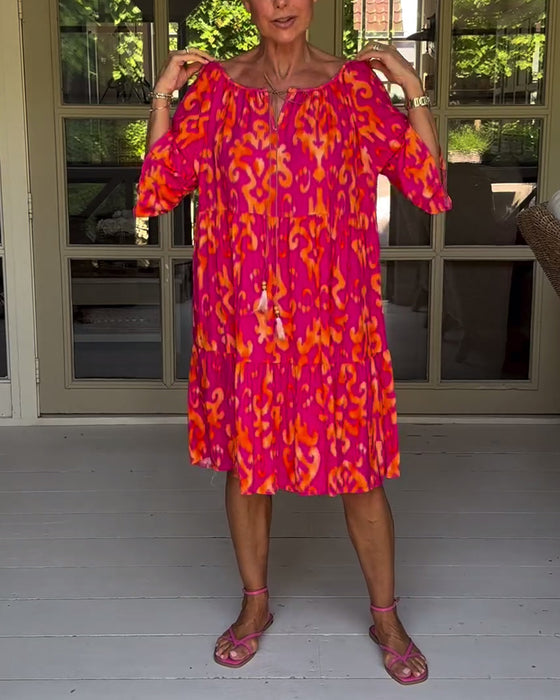Jurk met losse print en klokmouwen