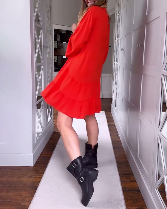 Effen kleur uitlopende patchworkjurk met lange mouwen en V-hals