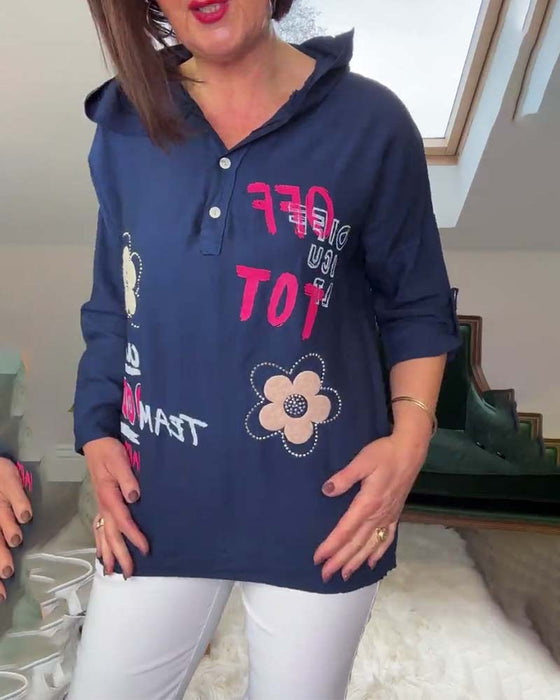 Casual top met capuchon en lange mouwen, geborduurd met bloemenletters