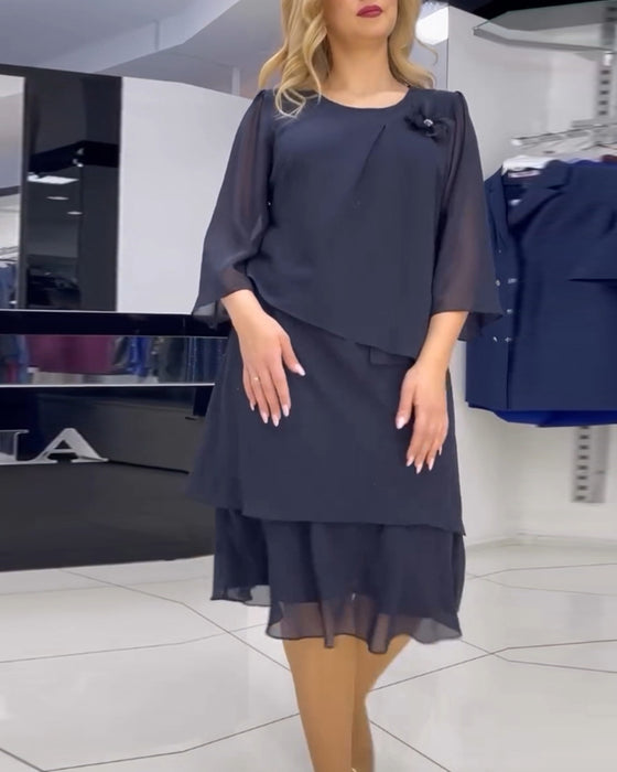 Elegante effen jurk met onregelmatige patchwork