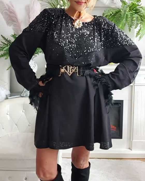 Modieuze Wijde Jurk Met Pailletten En Patchworkdetails