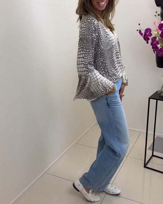 Blouse met bloemmotief en koord