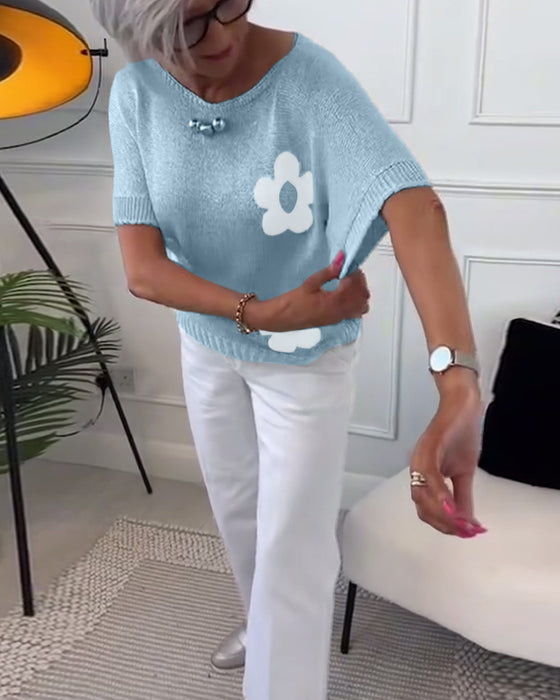 Smalle trui met ronde hals en bloemenprint