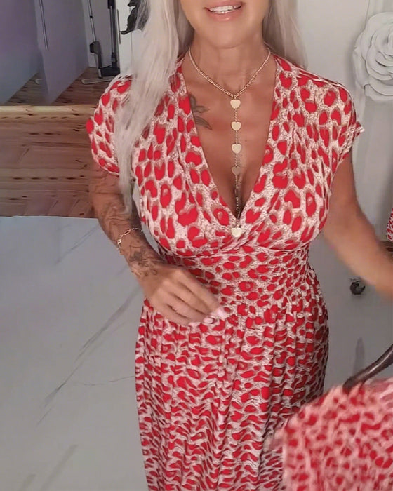 Elegante jurk met luipaardprint en v-hals