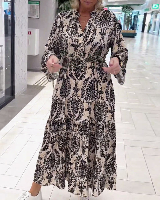 Jurk met trekkoord en klokmouwen met print