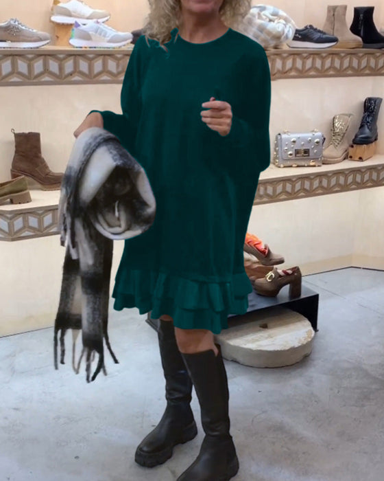 Jurk met een elegant silhouet en lange mouwen