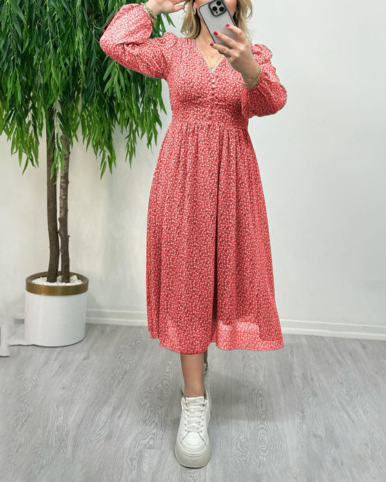 Elegante jurk met knopen en print