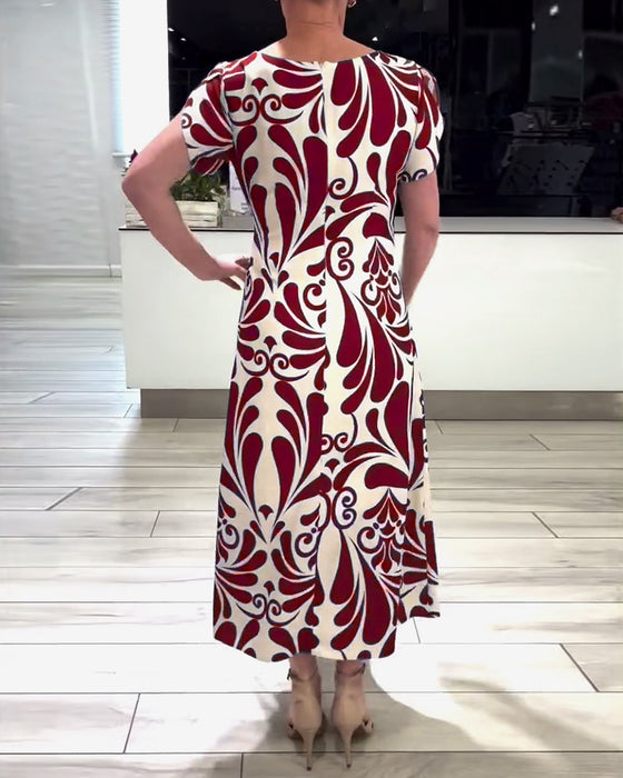 Elegante jurk met korte mouwen en contrastprint