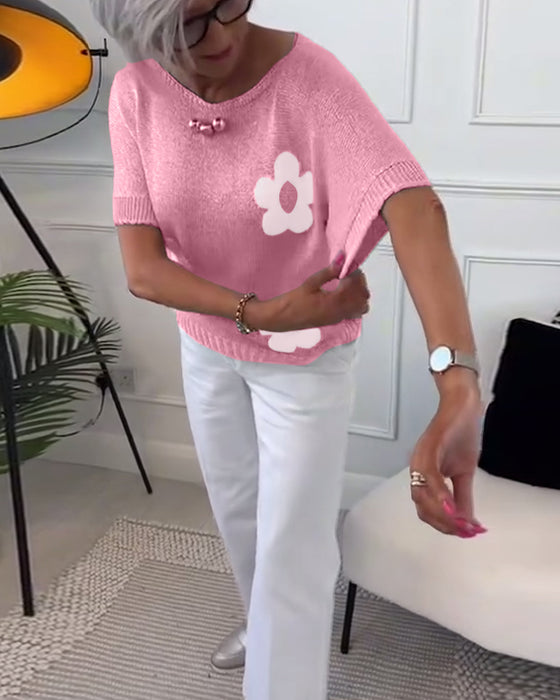 Smalle trui met ronde hals en bloemenprint