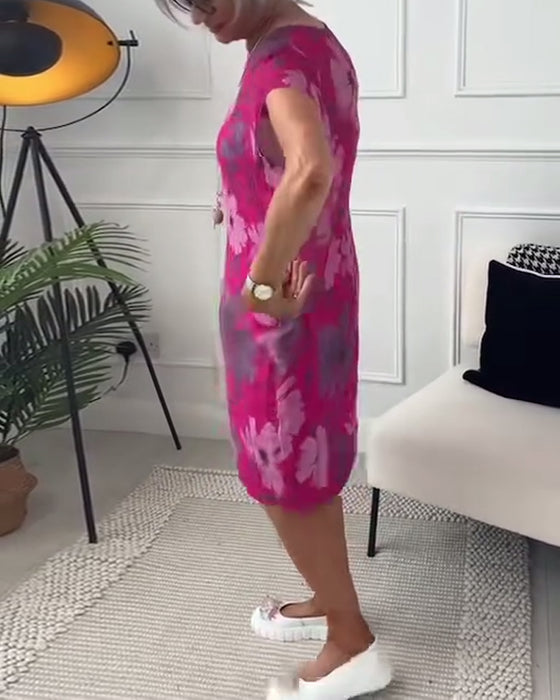 Casual losse jurk met bloemenprint, korte mouwen en zakken