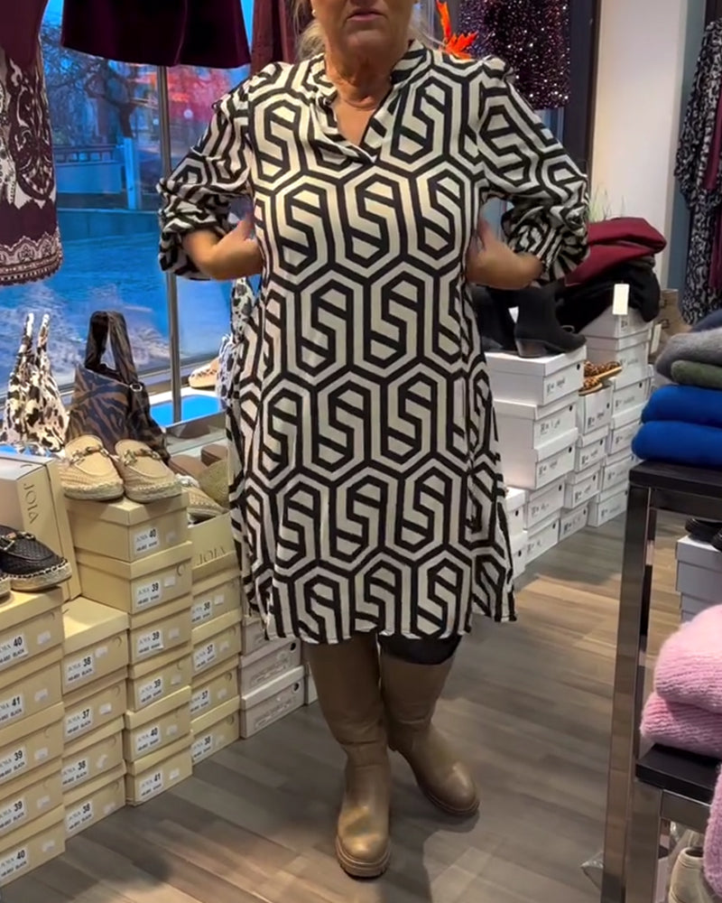 Stijlvolle jurk met V-hals en geometrisch patroon