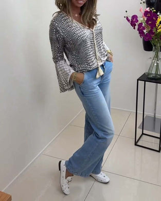 Blouse met bloemmotief en koord