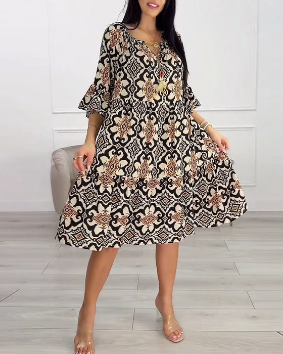 Jurk met vintage print tot op de knie