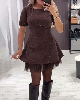 Elegante jurk met glinsterende mesh-patchwork