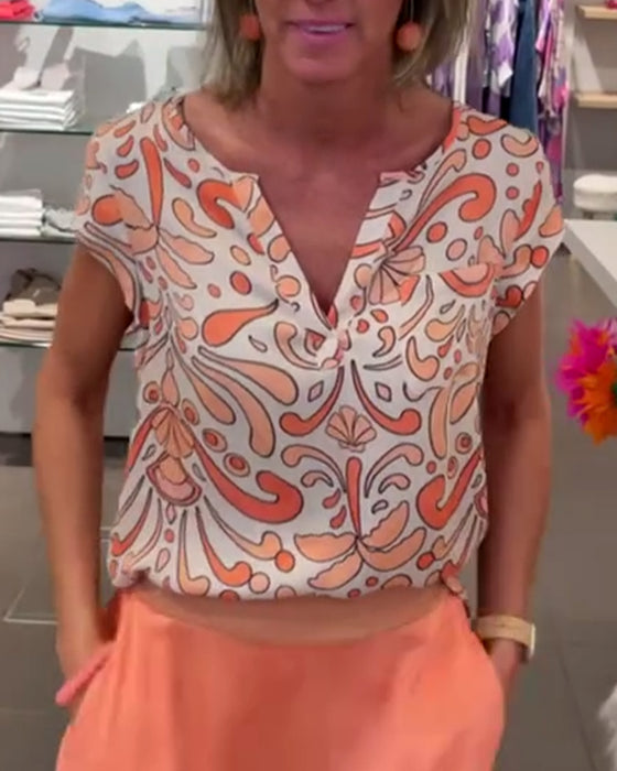 Casual blouse met V-hals en raglanmouwen met print