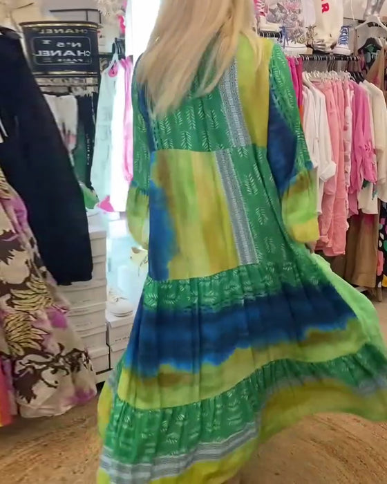 Casual lange jurk met V-hals, uitlopende mouwen en print