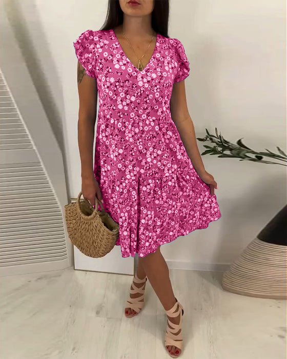 Mouwloze midi-jurk met V-hals en bloemenprint