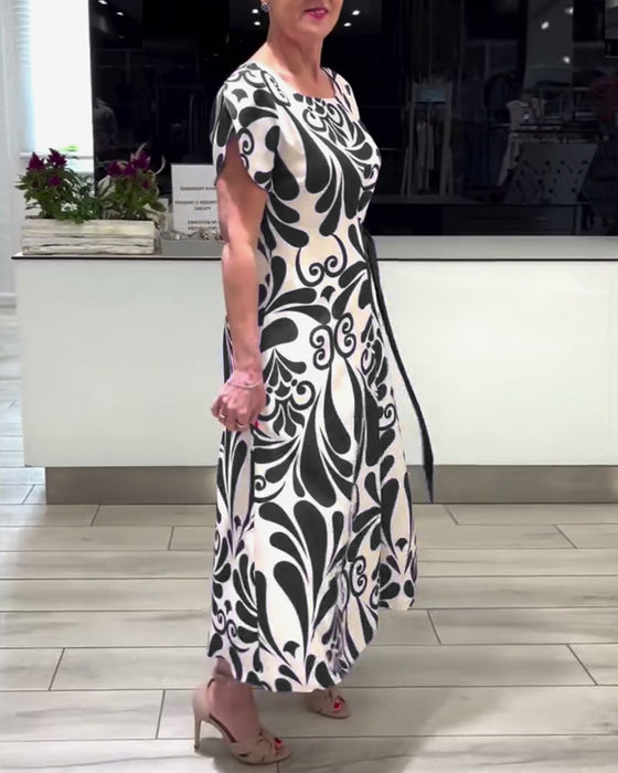Elegante jurk met korte mouwen en contrastprint