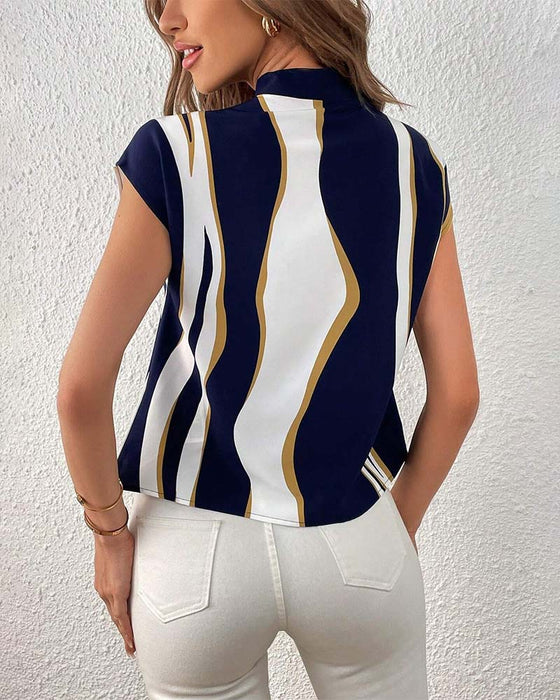 Blouse met veters en korte mouwen met contrasterende print