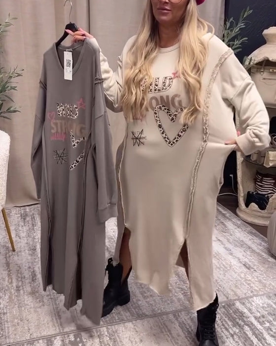 Losse jurk met lange mouwen en print