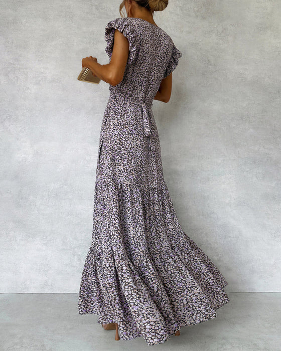 Elegante jurk met ruches aan de mouwen en split