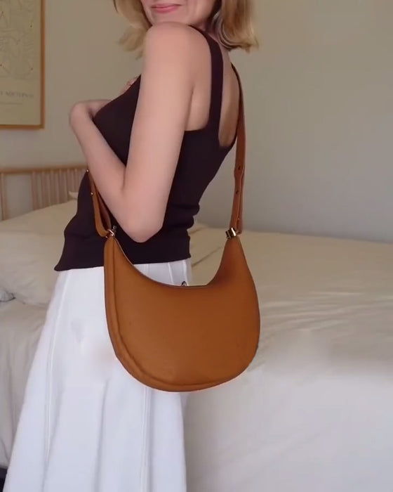 Effen kleur elegante halvemaanvormige schoudertas onder de arm