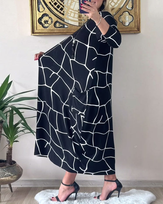 Jurk ronde hals lange mouw zak los