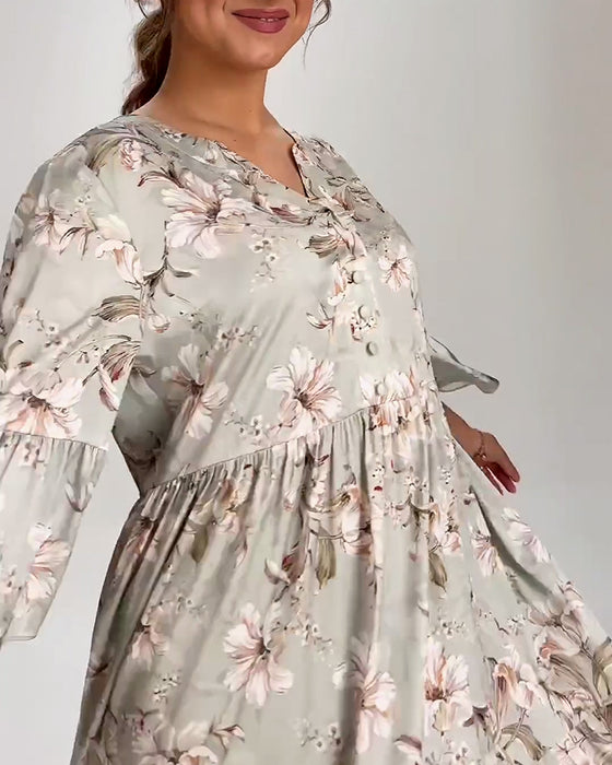 Jurk met bloemenprint en klokmouwen