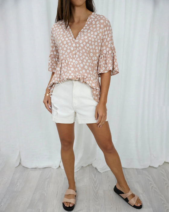 Bloemenblouse met V-hals en klokmouwen