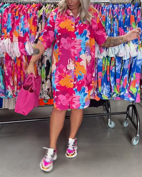 Kleurrijke midi-jurk met revers en bloemenprint