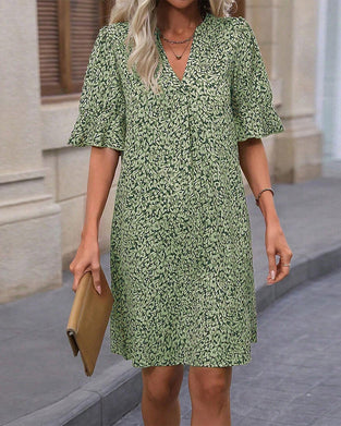 Elegante jurk met V-hals en print